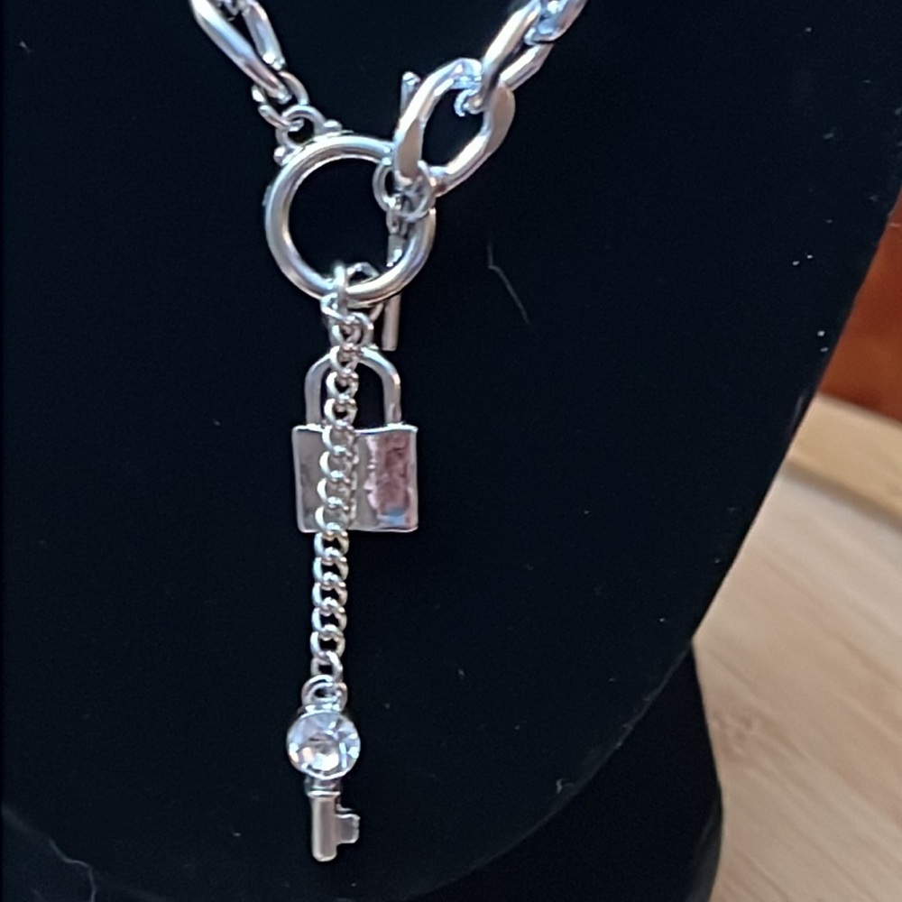 Women’s silver tone heart and key necklace
